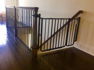 Baby gate installed on an oversized staircase in New Jersey